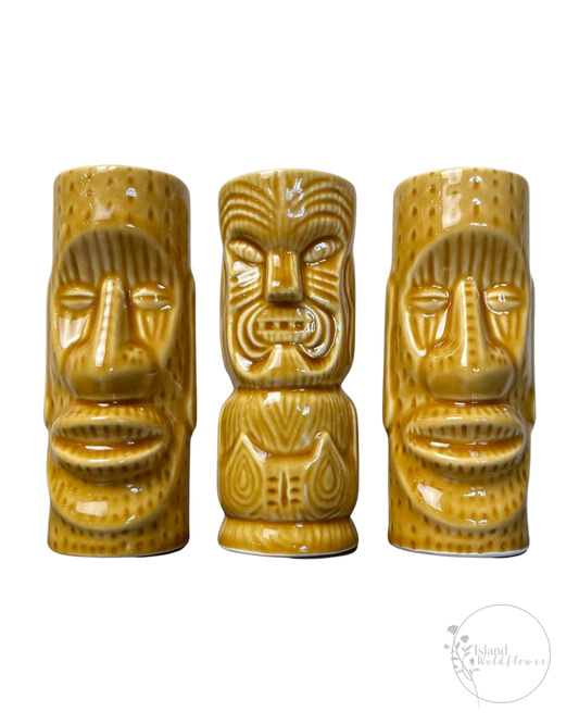 Front view: Exotic Tiki Mug Trio - Set of Three Ceramic Tiki Mugs in Golden Brown Glaze